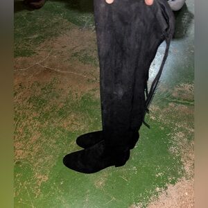 Thigh high black boots